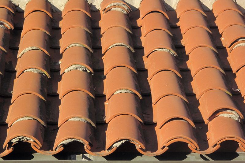 Clay tile roof under repair