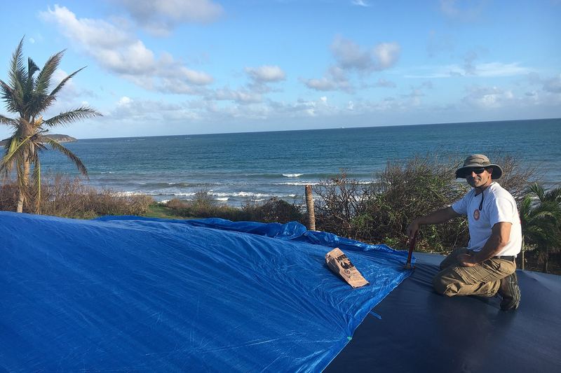 Temporary roof repairs on a house